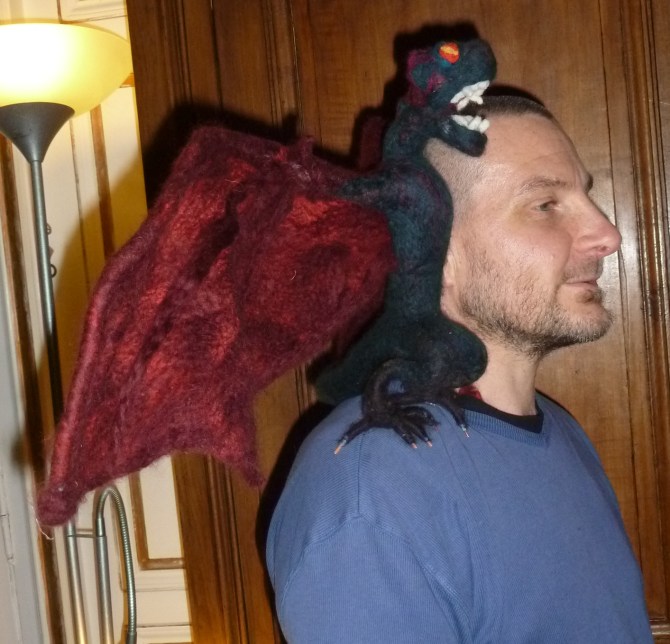 This dragon can sit on your shoulder thanks to magnets in his feet and one in his tail